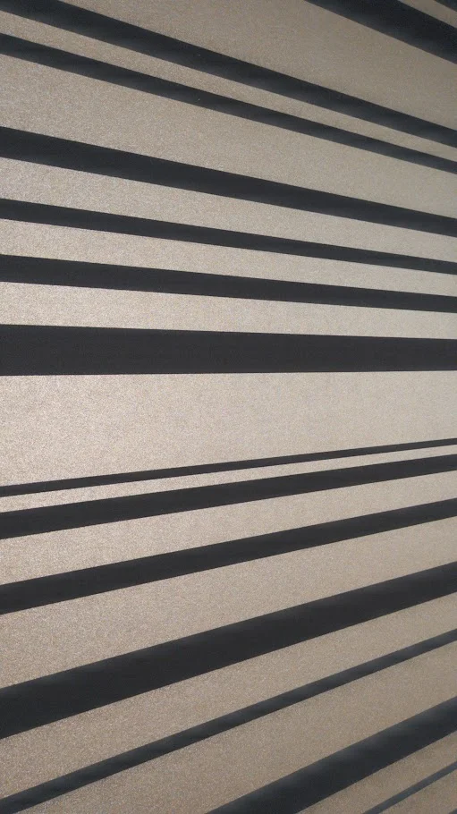 Akzentwand mit Design- bzw. Fototapete
